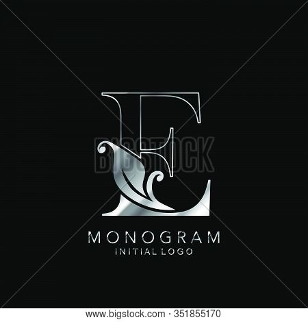 Monogram Initial Logo Letter E. Silver Vector Design Concept Floral Leaves For Business Identity.