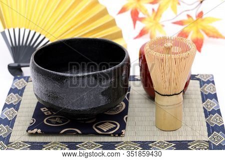 Tea Bowl With Tea Whisk Used In Japanese Matcha Green Tea Ceremony On White Hackgrond