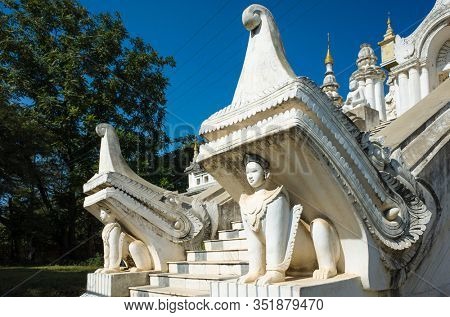 Sculptures of stairway to Atumashi Monastery, formally Maha Atulaveyan Kyaungdawgyi - Buddhist monastery in Mandalay, Myanmar. Architectural detail