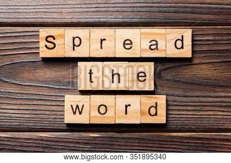 Spread The Word Word Written On Wood Block. Spread The Word Text On Table, Concept