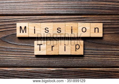 Mission Trip Word Written On Wood Block. Mission Trip Text On Table, Concept