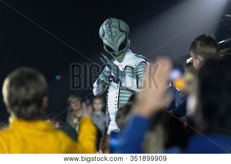 ST. PETERSBURG, RUSSIA - DECEMBER 27, 2019: Circus actor dressed as extraterrestrial performs in the circus during the premiere of the show OFU. Landing in Saint-Petersburg