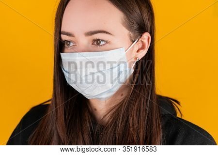 Girl in a medical mask. coronavirus. Health Protection Methods
