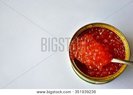 The Large Jar Of Red Caviar With The Spoon