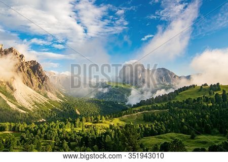 Magnificent View Of Sassolungo Massif And Gardena Valley Covered By White Clouds, Dolomites, Italy