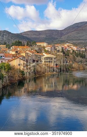 Bosnia And Herzegovina, Republika Srpska. View Of Trebinje City On Winter Day. Clouds, Mountains And