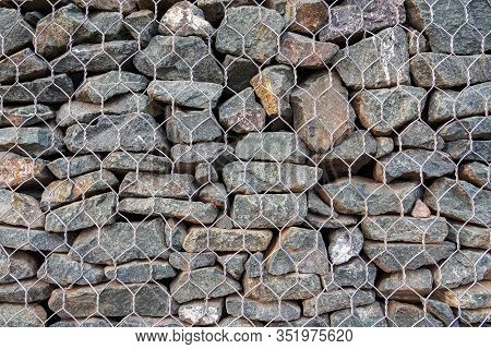 Mesh And Stone Fence, Close-up Of Gabion For Use In Civil Engineering, Road Building Landscaping