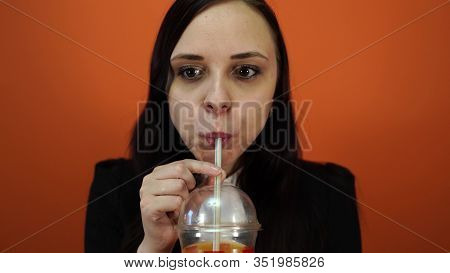 Thirsty For A Drink. Cute Woman Drink Through Straw. Pretty Woman Sip Beverage With Drinking Straw.