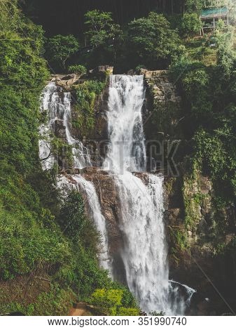 Toned Photo Of Waterfall Cascade In The Tropical Jungle Forest
