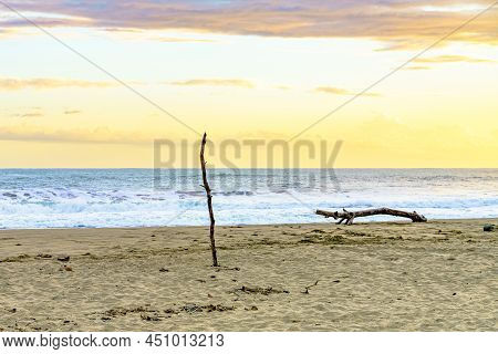 Sunrise At Playa Cocles, Caribbean Beach, Puerto Viejo, Costa Rica East Coast And Log That Looks Lik