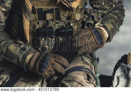 Batlle Ready Armed Vest Of A Field Soldier . High Quality Photo