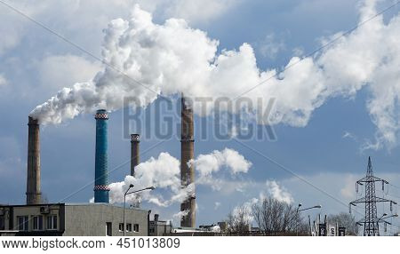 Bucharest, Romania - March 10, 2022: The Chimneys Of The Cet Sud Power Plant, Which Pollute With Smo