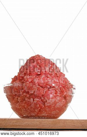 Minced Pork. Fresh Raw Minced Meat In A Cup On A Wooden Table Isolated On White Background.minced Me