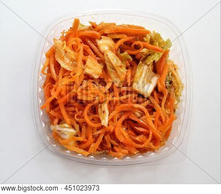 Chinese Cabbage Kimchi In A Plastic Container. Kimchi With Carrots, Cabbage, .