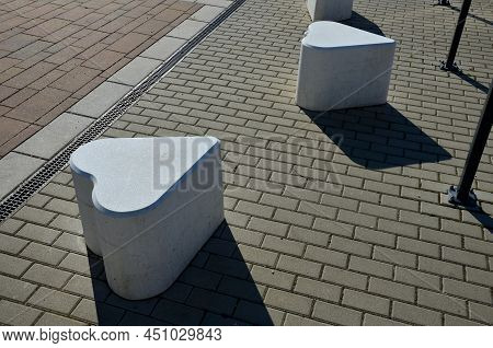 Smooth Concrete Chair-sized Castings. Suitable As An Urban Design Barrier To Enter The Pedestrian Zo