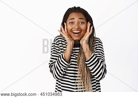 Portrait Of Extremely Happy Black Girl Reacting To Super Good News, Smiling And Laughing, Looking Su