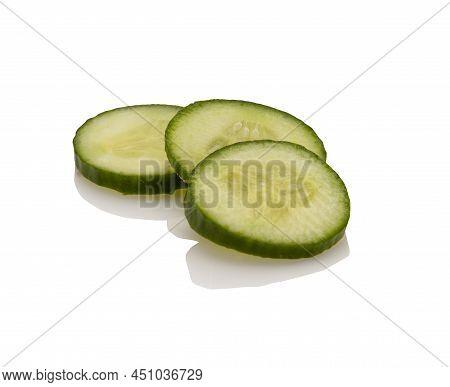 Fresh Cucumber Slices Isolated On A White Background
