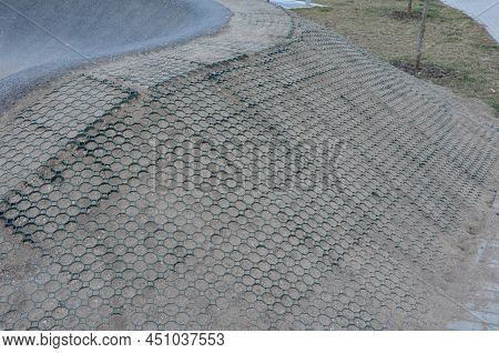 Edge Of Off-road Asphalt Track With Jumps And Undulating Surface And Jumps On Bumps. Track For Scoot