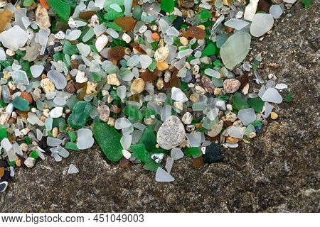 Colored Crystals Eroded By The Sea In The Beach Of The Crystals In The Silleiro Cape In Pontevedra