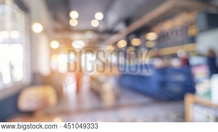Blurred Background Shopping Mall Light Bokeh Business Event In Retail Store. Blurry Abstract Backgro