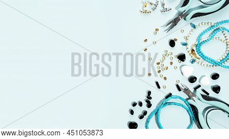 Tools And Accessories For Diy Jewelry In The Workplace. Flat Lay On Blue Cyan Background. Creative F