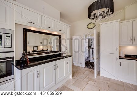 Modern Fitted Kitchen With Built In Cupboards And Appliances In Renovated Former Victorian Rectory W