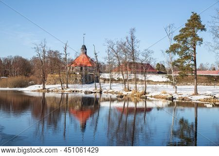 Ancient Fortress Of Korela Is Reflected In The Water Of The Vuoksa River. Early Spring Natural Lands