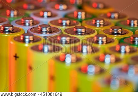 Closeup Of Positive Ends Of Discharged Batteries Aa Sizes, Macro Shot, Selective Focus. Used Alkalin