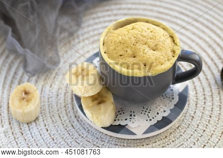 Homemade Portioned Banana Bread Mugcake In Small Mugs.