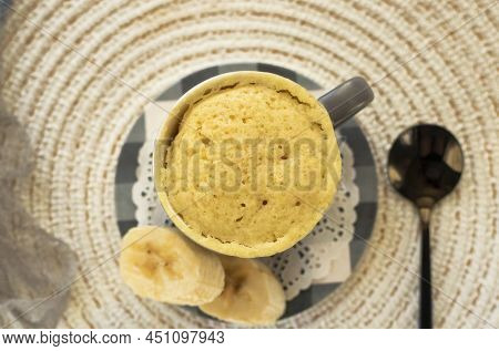 Homemade Portioned Banana Bread Mugcake In Small Mugs.