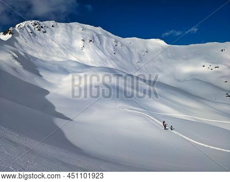 Skitour In Davos. Ski Mountaineering On The Chorbschhorn From The Strela Pass. Winter Landscape In T