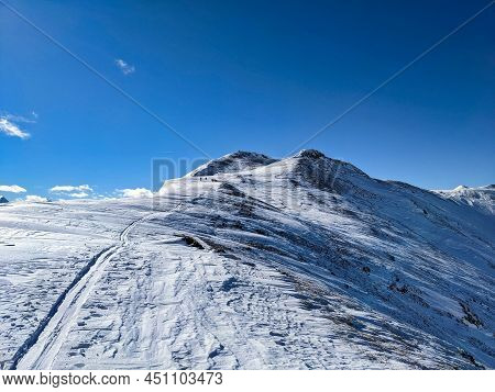Skitour In Davos. Ski Mountaineering On The Chorbschhorn From The Strela Pass. Winter Landscape In T