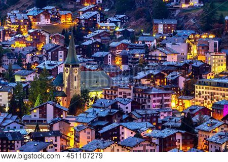 Zermatt, Switzerland Aerial Town View By Night. Swiss Alps