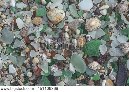 Colored Crystals Eroded By The Sea In The Beach Of The Crystals In The Silleiro Cape In Pontevedra