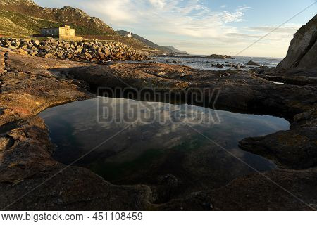Silleiro Cape And Old And New Lighthouses At Sunset In Ponteverdra, Galicia, Spain