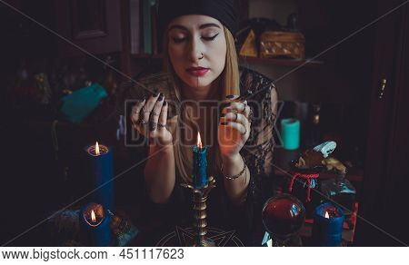 Shaman Woman Doing Ritual Magic For Helping. Concept Of Pagan Or Wicca Magic. Old And New World