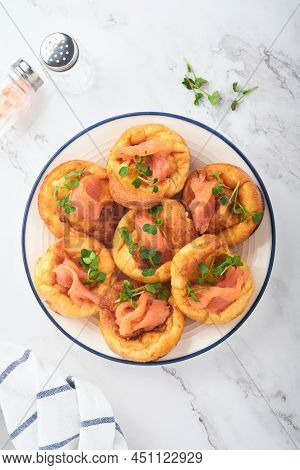 Yorkshire Pudding. Traditional English Yorkshire Pudding With Salmon And Radish Microgreens Side Dis