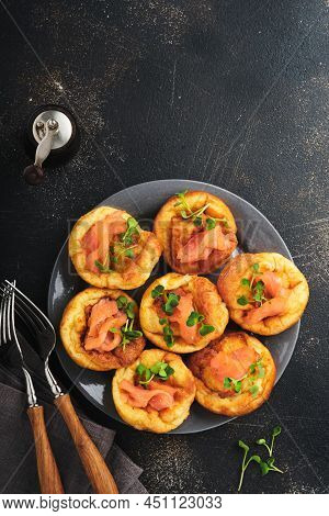Yorkshire Pudding. Traditional English Yorkshire Pudding With Salmon And Radish Microgreens Side Dis