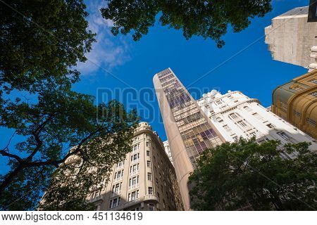 Buildings And Trees In Cinelandia Square In Rio De Janeiro City Downtown
