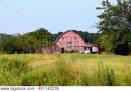 Arkansas Farm With Red Wooden Barn