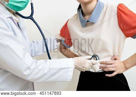 Asian Child Girl With Flatulence,bloated Stomach Checking The Abdomen,physical Examination,doctor Us