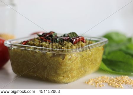 One Pot Preparation Made Of Basmati Rice, Yellow Mung Lentils, Blanched And Pureed Spinach And Spice