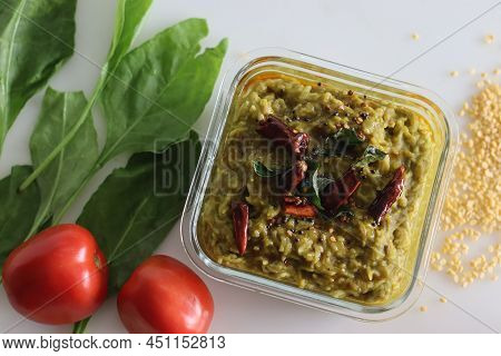 One Pot Preparation Made Of Basmati Rice, Yellow Mung Lentils, Blanched And Pureed Spinach And Spice