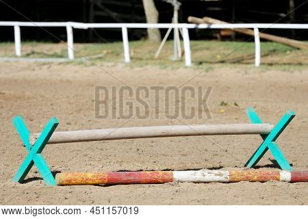 Show Jumping Poles Obstacles, Barriers, Waiting For Riders On Show Jumping Training. Horse Obstacle 