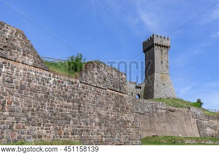Radicofani - Italy. June 04, 2021: Close View To The Brick Walls Of Radicofani Construction And Towe
