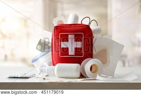 Medicine Cabinet Of A Medical Center Full Of Medical Objects And Tools For Cures On A White Table. F