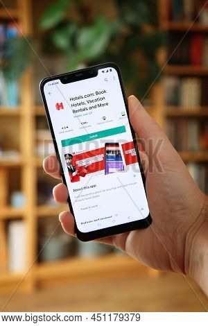 Warsaw, Poland - January 29, 2021: User Installing Hotels.com Travel App On An Android Os, Xiaomi Br