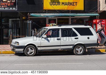 Antalya; Turkey - March 04 2022: White Tofas Dogan Parked On The Street On A Warm Summer Day