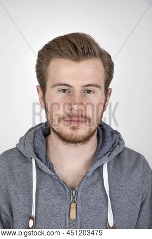 Portrait Of Young Man With Beart In Casual Clothes Looking Cool