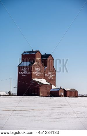 Rowley, Alberta - March 6, 2022: Grain Elevators In The Ghost Town Of Rowley In Winter.
